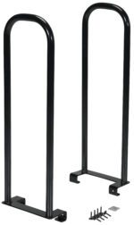 Two black, U-shaped metal bike racks stand vertically on a white background, alongside screws and bolts for installation. Nearby are Vestil Dolly Converters, capable of supporting up to 250 lbs with dimensions of 5 x 12 x 37 inches.