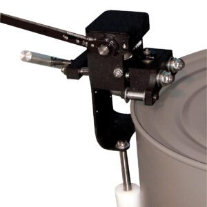 A can seamer, akin to a Vestil Burr-Free Manual Drum Deheader 3-5 Pass, efficiently seals by clamping onto a metal rim. It features a lever and metallic parts including a roller and cylindrical tool.