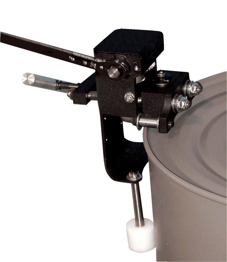 DD-EZ-M_A.jpg A can seamer, akin to a Vestil Burr-Free Manual Drum Deheader 3-5 Pass, efficiently seals by clamping onto a metal rim. It features a lever and metallic parts including a roller and cylindrical tool.