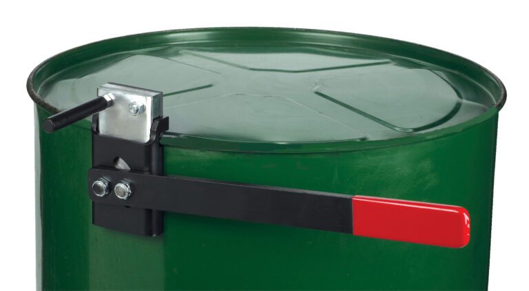 A glossy green metal drum with a smooth surface features a black and red lever latch. Its lid is secured using a Vestil Manual Drum Deheader 1 Pass, ensuring easy handling.