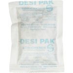 The compact, white DESI PAK labeled 3 x 4 x 1/4 Tyvek® Clay Desiccant features blue text and vital instructions like Do Not Eat. Designed for moisture absorption, each desiccant is sold in a 34-gallon drum containing 1300 units by SÜD-CHEMIE Performance Packaging.