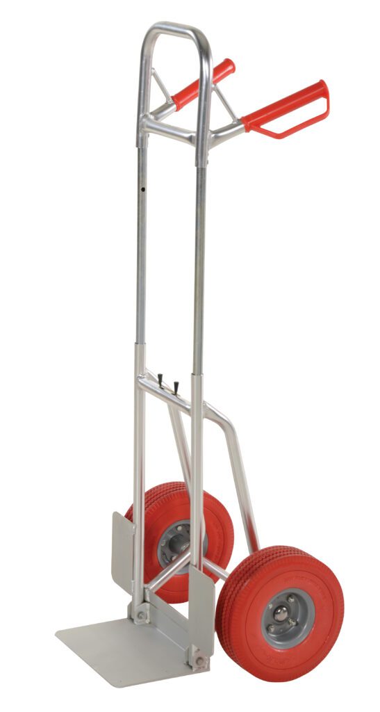 DHHT-250A-FD-UR_A.jpg The Vestil Fold-Down Aluminum Hand Truck-Red Ureth features a silver construction with red urethane handles and tires. Its sturdy metal frame and flat loading platform make it ideal for transporting heavy items efficiently.