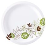 A white plate with green and brown leaf and vine designs along one edge matches the style and durability of Dixie® Paper Plates - 10 1/4 Heavyweight, White (500/Case), making it perfect for any setting.