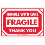 The MH-USA 2 x 3 sign includes bold text HANDLE WITH CARE FRAGILE THANK YOU and MADE IN AMERICA, akin to our MH-USA 2 x 3 - Fragile - Handle With Care Labels, available in rolls of 500.