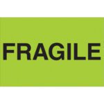 A fluorescent green sign resembling MH-USA 2 x 3 Fragile (Fluorescent Green) Labels shows the word FRAGILE in bold black letters.