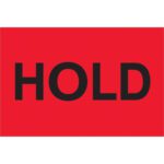 A fluorescent red sign features the bold black word HOLD, similar to MH-USA 2 x 3 - Hold (Fluorescent Red) Labels with 500 per roll.