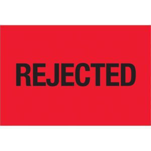 The image highlights a vibrant fluorescent red background with the word REJECTED boldly in black at the center, resembling MH-USA 2 x 3 - Rejected labels (Fluorescent Red) available in rolls of 500.