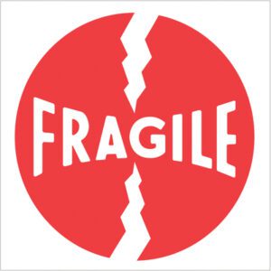 A red circle with FRAGILE in bold white letters features a jagged line for a cracked look, ideal for MH-USA 4 x 4 - Fragile Labels (500/Roll).