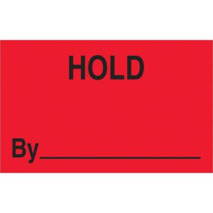 The MH-USA 1 1/4 x 2 fluorescent red labels feature HOLD in bold black and By with a blank line, ideal for organization. Each roll contains 500 tags.