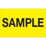 A MH-USA 1 1/4 x 2 fluorescent yellow label displays the word SAMPLE in bold black capital letters at the center.