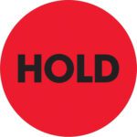 The MH-USA 2 Circle - Hold Fluorescent Red Labels come in rolls of 500, featuring a bright red color with HOLD prominently in bold black letters.