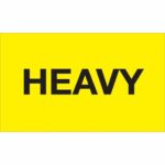 A bright yellow rectangular sign displaying the word HEAVY in bold black letters, similar to MH-USA 3 x 5 - Heavy (Fluorescent Yellow) Labels that come in rolls of 500.
