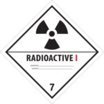 The MH-USA 4 x 4 Radioactive I label is white and diamond-shaped, featuring a black radiation symbol at the top. It has fields for Contents and Activity, with the number 7 at the bottom. Sold as a roll of 500 labels.