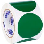 A roll of MH-USA 3 Green Inventory Circle Labels (500/Roll) features white stickers with large green dots, and the inside bears the Tape Logic logo in blue and red.
