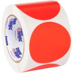 A roll of MH-USA 3 Fluorescent Red Inventory Circle Labels (500/Roll) with large circular stickers, enhanced by a glossy finish for vibrancy, featuring the repeated tape logic logo inside.