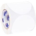 A roll of clear packing tape stands upright, showcasing tape logic branding. With its unused sheen, it mirrors the pristine look of MH-USA 4 White Inventory Circle Labels, which impress with 500 labels per roll.