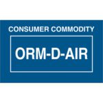 The MH-USA labels are blue, rectangular (1 3/8 x 2 1/4), with white text CONSUMER COMMODITY and ORM-D-AIR, enclosed in a thin border. Sold in rolls of 500, they meet MH-USA requirements.