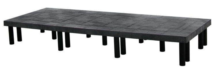DRP-S-9636_A.jpg The Vestil Dunnage Rack Solid Top - 96 X 36 has a textured, black rectangular platform supported by evenly distributed cylindrical black legs underneath.