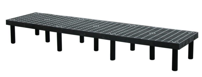 The Vestil Dunnage Rack Vented Top - 96 X 24 is a black plastic drainage channel with a grated surface and multiple support legs, perfect for water management or drainage tasks due to its elevated, rectangular design.