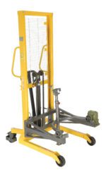 The Vestil Drum Lifter/Rotator/Transport/Steel Jaw is a yellow hydraulic tool with a metal frame and wheeled base, featuring handles, a lifting mechanism with chains, and adjustable steel jaws for securely handling drums, ideal for industrial use.