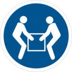Icon of two figures lifting a box together, symbolizing teamwork, outlined in white on a circular blue background. Resembles the MH-USA 2 Circle - 2 Person Lift Durable Safety Label, sold in rolls of 25.