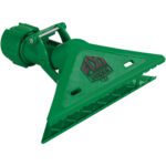 The FIXI-Clamp is a green triangular road warning device featuring a textured surface and a secure locking mechanism at the top, ensuring stability and visibility on the road.