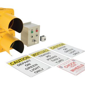 The Vestil Aluminum Housing Dock Traffic System features a yellow light, two empty casings, a control box with buttons and indicators, and four caution signs: DEPART ON GREEN LIGHT ONLY, ENTER ON GREEN LIGHT ONLY, and CHECK YOUR WHEELS.