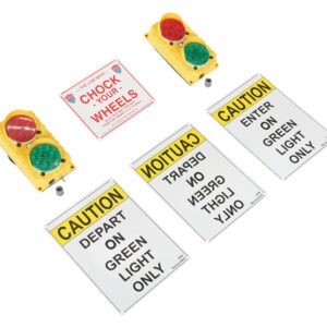 The Vestil Traffic System Stop Go Set 12V LED includes two signal lights—red and green—above three caution signs that read: Depart On Green Light Only, Caution Enter On Green Light Only, and Caution Chock Your Wheels.