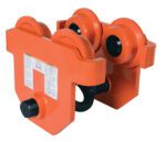The Vestil Eye Manual Trolley Push 10K Capacity is a bright orange industrial trolley designed for heavy lifting. It features four wheels, bolts, and labels with specifications and safety information.