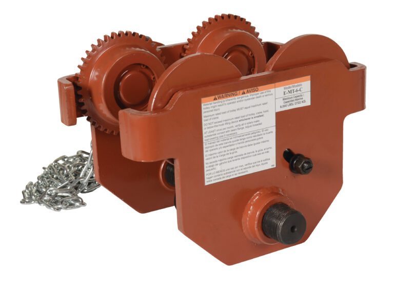 E-MT-6-C_A.jpg The Vestil Eye Manual Trolley Geared 6K Capacity is a red industrial trolley with wheels and gears for overhead lifting, featuring warnings and specs on its label. A side chain signifies its geared mechanism.