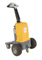 The Vestil Electric Powered Tugger 3K Pull Capacity, in yellow and gray, has two large rubber wheels and a smaller one. It features a long black handle with a control panel at the top, designed for moving heavy loads effortlessly.