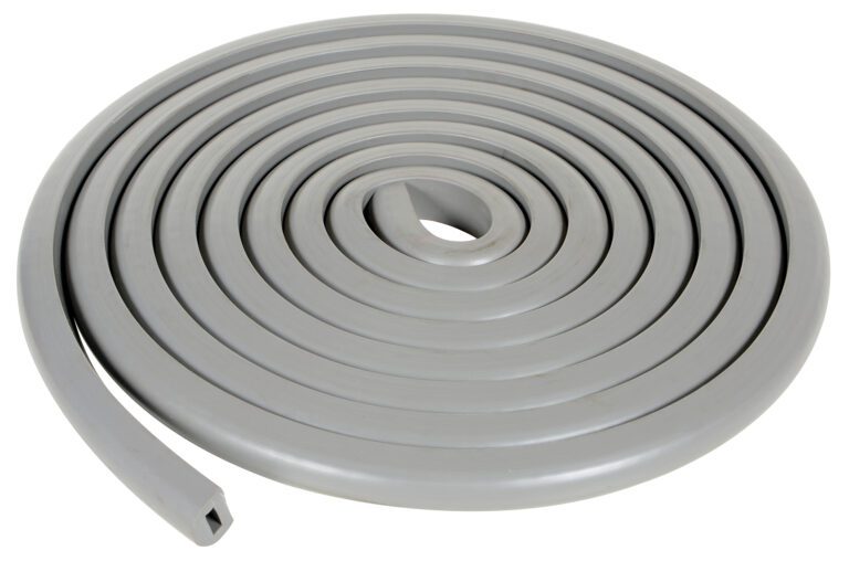 Close-up of a gray coiled hose on a white backdrop, echoing the precision of Vestil Rubber Edge Corner and Surface Guards, neatly spiraled with its inner end at the center.
