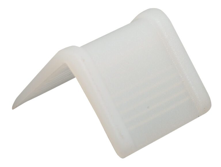 A close-up shows a white, L-shaped corner protector from the Vestil Plastic Edge Guards 1000 Pcs 1X1.25 collection, created to cover and shield sharp corners for safety. It features a smooth texture with subtle ridges.