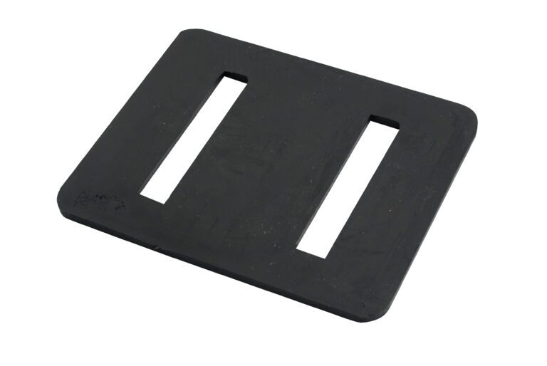 A black rectangular plastic buckle with two vertical slots for threading straps or belts complements the Vestil Rubber Edge Guards 5 X 6 pack of 100. Its surface is smooth, slightly reflective, and shows minor light scuff marks.