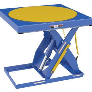 The Vestil Built-In Manual Scissor Table Carousel-Ehlt has a blue hydraulic lift, square base, and round yellow platform. Designed for industrial tasks, it includes safety measures for efficient lifting or rotating of objects.