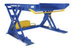 Meet the Vestil Ground Lift Scissor Table 2K 52 X 51.5, a blue hydraulic scissor lift with a yellow pump underneath, featuring a flat platform and robust metal frame for material handling and industrial tasks.