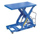 The Vestil Lift Table, a portable hydraulic lift table, features a sturdy rectangular top and scissor lift mechanism. It operates on 460V 3Ph power, has four small wheels for easy mobility, and can accommodate weights up to 2000#.