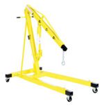 The Vestil Engine Hoist features telescopic legs and a sturdy wheeled base. This yellow hydraulic marvel includes an extendable arm with a black hook, offers 4K capacity, and multiple adjustment points for versatile lifting of heavy objects.