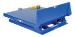 A blue dock leveler resembling the robust Vestil Hinge Tilt Table has a rectangular platform, hydraulic mechanisms underneath, a safety warning label, a yellow coiled cable, and a small control box on one side. It supports up to 4K lb capacity with dimensions of 48 X 47.75.