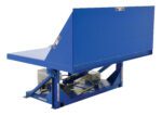 The blue mechanical dock leveler, similar to the Vestil Tilt Table 90 Degree 4K Lb Cap 60W X 50L, has a sturdy platform with an exposed hydraulic system, a triangular backstop, and safety labels, making it ideal for industrial alignment of dock heights during loading and unloading.