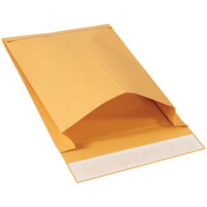The 9 1/2 x 13 x 2 Kraft Expandable Self-Seal Envelopes (250/Case), highlighted against a white backdrop, display durable construction. The opened flap shows a white adhesive strip, demonstrating the envelopes capacity and durability.