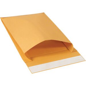 A 12 x 15 x 3 Kraft Expandable Self-Seal Envelope from a bulk set of 250 lies flat with its adhesive strip visible on the flap, ready for use.