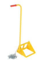 A yellow manual tire bead breaker with a long handle and red grip matches the durability of the Vestil Fabricated Ergo-Handled Wheel Chock 10. It features a triangular base, an attached metal chain, and is designed for efficient tire bead separation from rims.