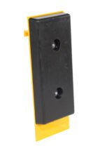 A black rectangular Vestil Fork Truck Carriage Bumper Class II features two circular indentations and is mounted on a yellow stand, likely serving as an industrial protective cover. The yellow stand extends beyond the bumper.