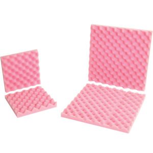 Three pink MH-USA 12 x 12 x 2 Anti-Static Convoluted Foam panels with an egg crate design absorb sound efficiently. Two stand vertically, one lies flat. Each case includes 24 sets for versatile use.