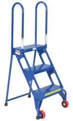 The Vestil Folding 3 Step Ladder With Wheels features a blue metal frame, three slip-resistant perforated steps, two front red wheels, and rubber-tipped back legs. Tall handrails enhance safety.