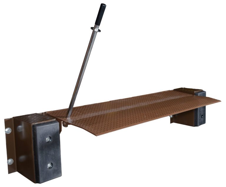 FM-2572_A.jpg The Vestil Mechanical Edge-O-Docklevelers 25K 72 In features a durable brown metal design with a diamond plate surface. It includes a long vertical handle, two black rubber bumpers, and an industrial-style angled surface.
