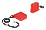 The Vestil Fork Tip Protector Thick Red features a thick red plastic with a rectangular shape and an attached black strap with a metal hook. Another similar red piece lacks the strap, and theres also a separate black strap with a clip for added functionality.