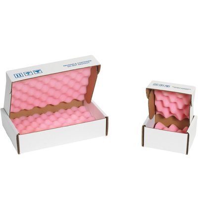 FSA18184.jpg Two white cardboard MH-USA 18 x 18 x 4 anti-static foam shippers are open, revealing their pink cushioning interiors; the larger box is on the left and the smaller on the right.