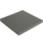 An angled view showcases the gray, square foam pads thickness and edges. Its part of the MH-USA 2 x 24 x 24 Charcoal Cloud Foam Sheets (6 Sheets/Case).